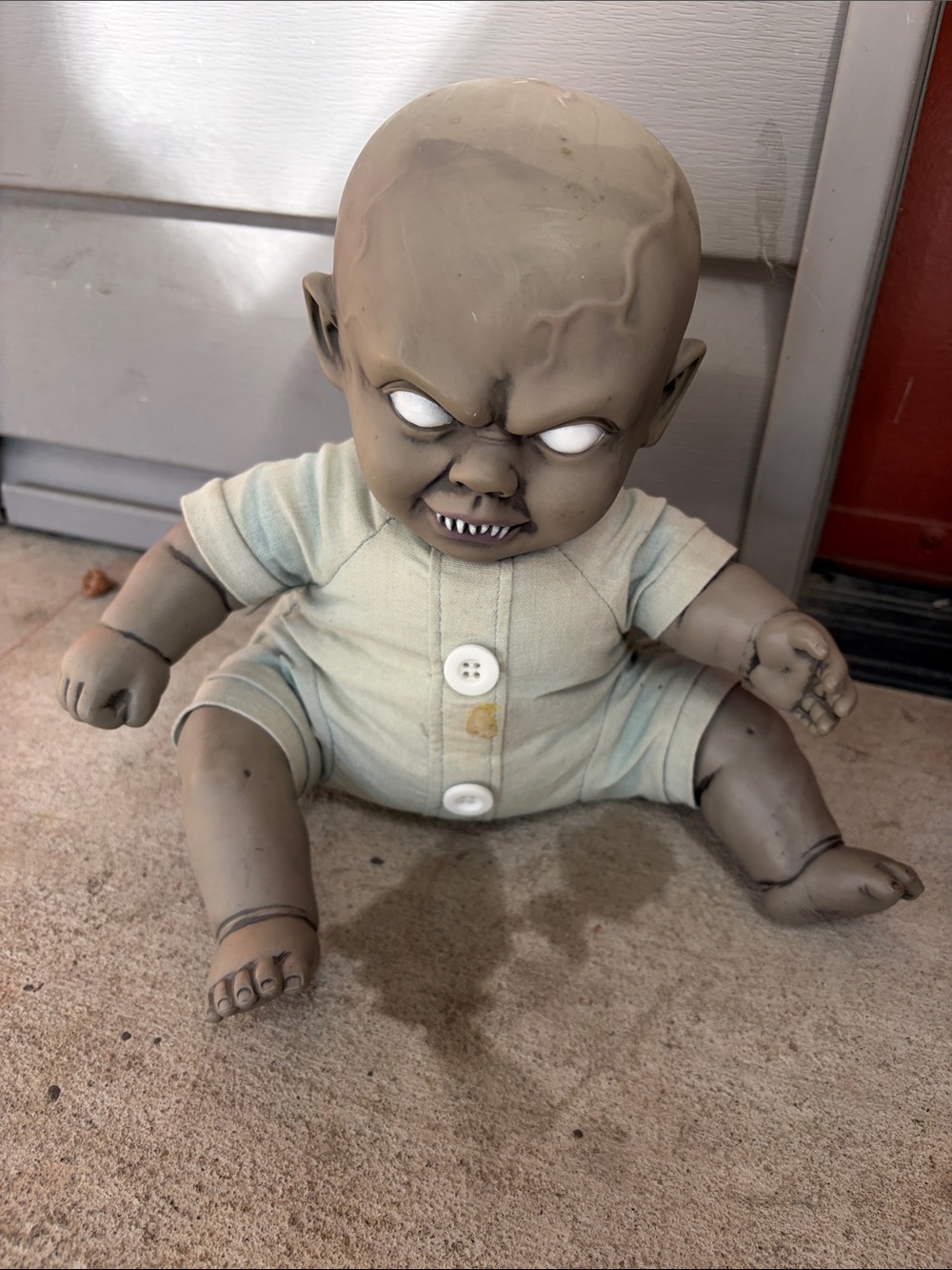 Spirit Halloween Animated Scary Baby prop known as "The Wiggler"